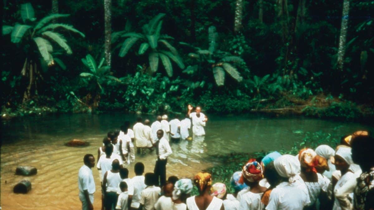 Missionaries and church leaders baptize